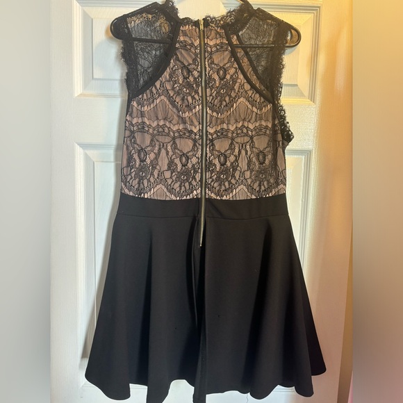 Revamped lace mini dress with built in shorts. Size XL - Picture 5 of 5